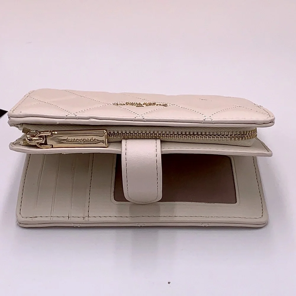 KATE SPADE Carey Medium Compact Bifold Wallet Parchment Color